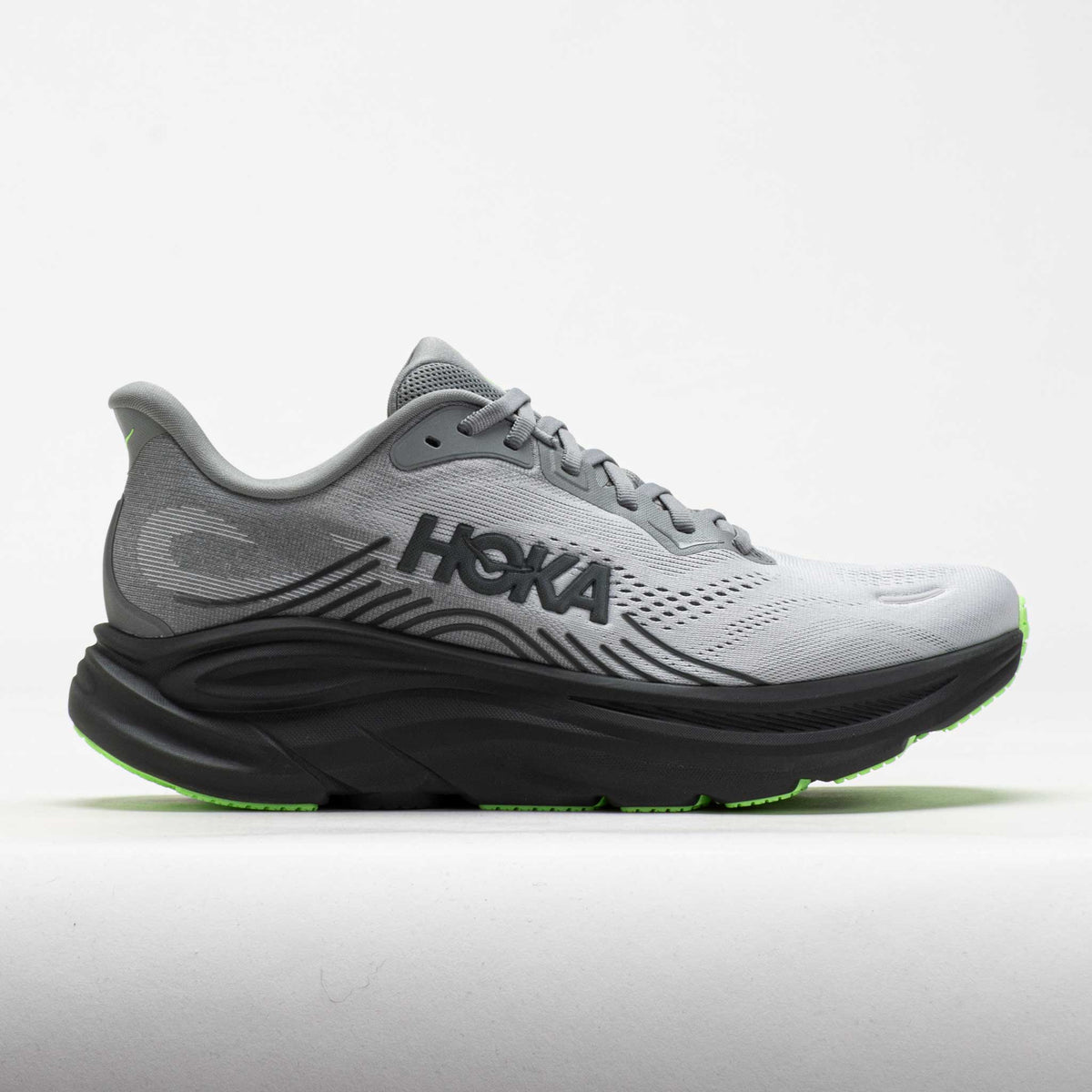 A Hoka Clifton 11 – Men's running shoe in light gray and black with a bright neon green outsole edge, shown in a side profile on a light gray background.