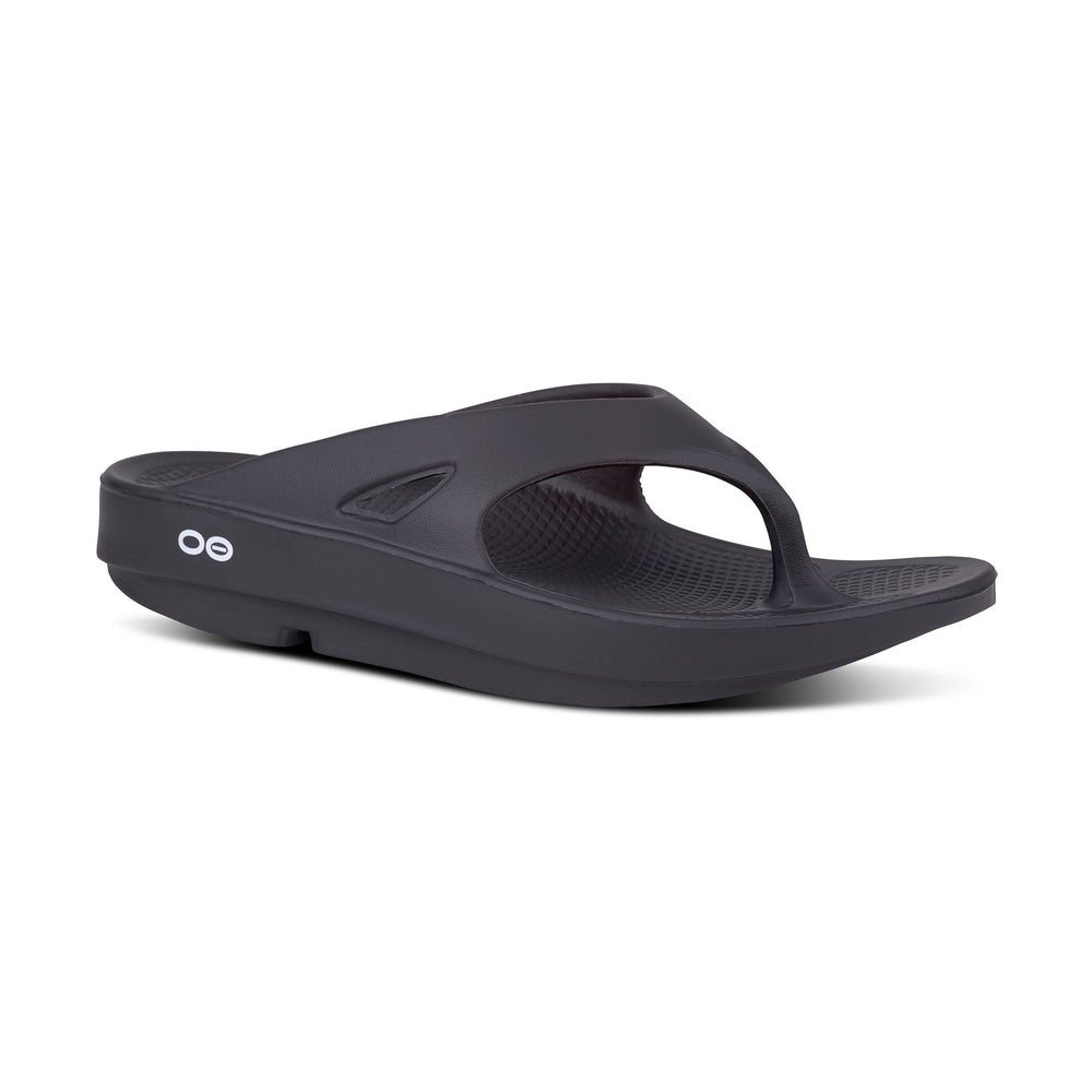 Black OOfos OOriginal sandal with 'oe' logo on a white background