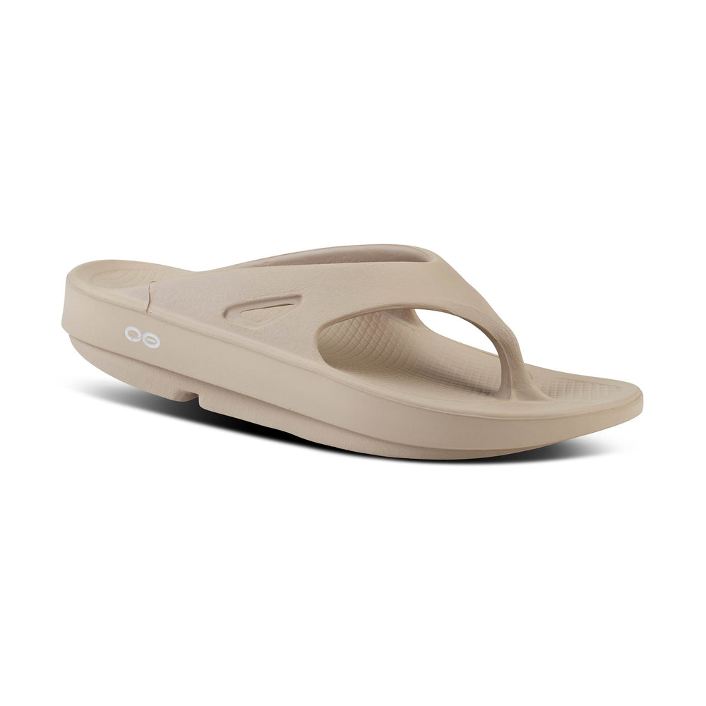 Beige OOfos OOriginal sandal on a white background
