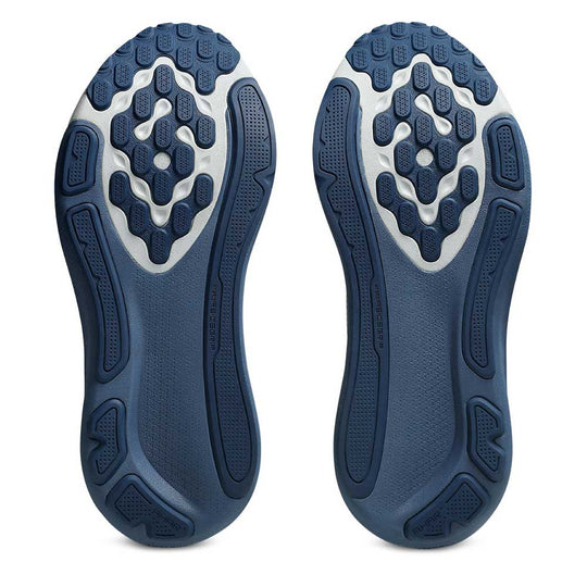 Blue shoe sole with a textured pattern on a white background