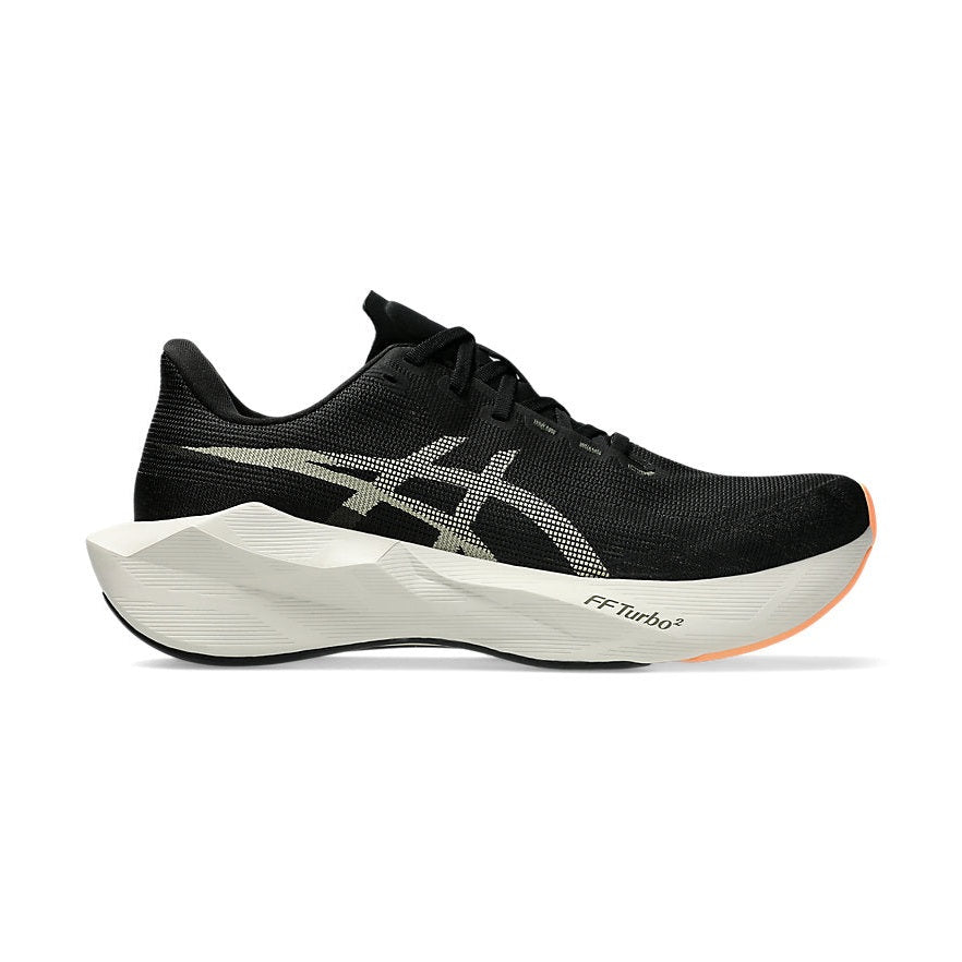 Novablast 6 a men's black running shoe with pink accents on a white background.
