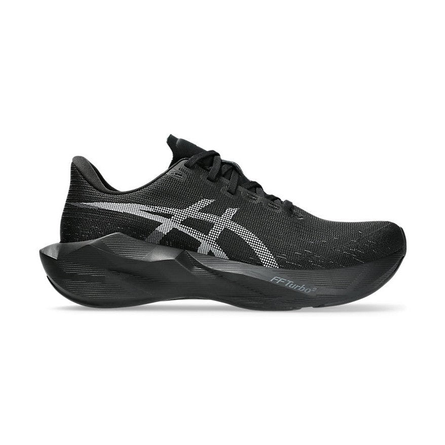 Novablast 6 a men's black athletic shoe with silver accents on a white background.