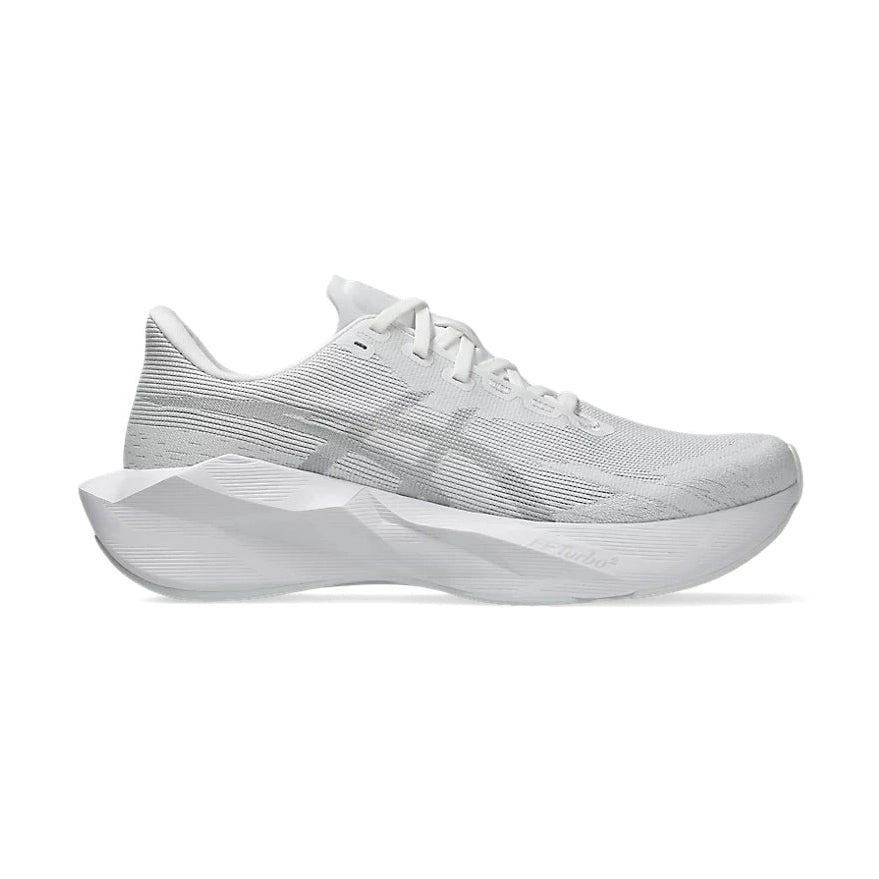 Novablast 6 a men's white shoe with Asics logo on a light gray background.