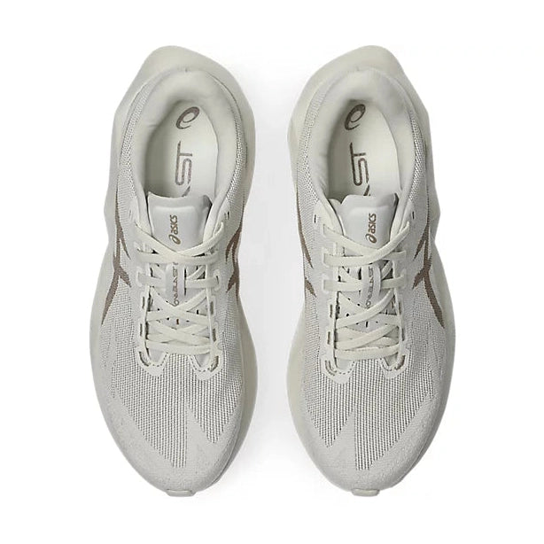 Novablast 6 a men's pair of oat and off-white ASICS running shoes shown from a top-down view on a clean white background.