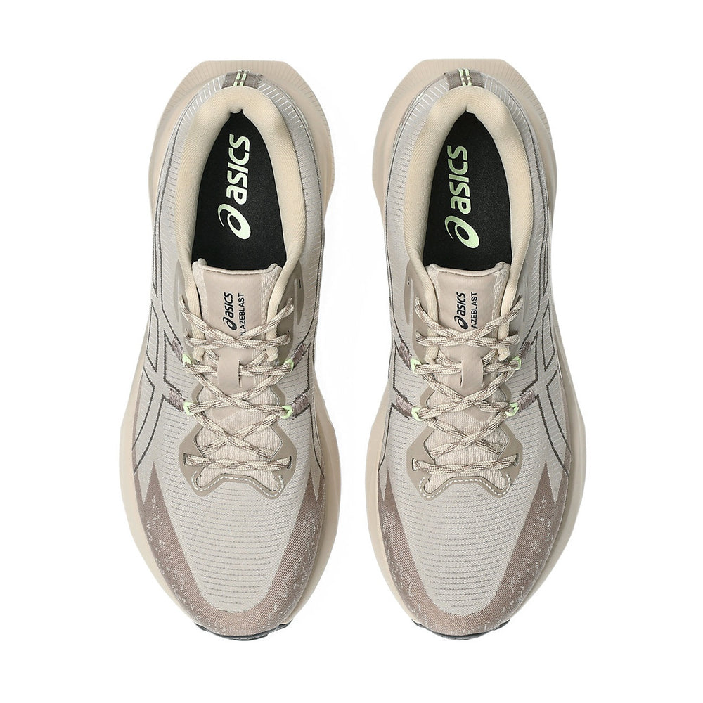 Blazeblast a men's pair of running shoes in light beige and gray with black and green accents, shown from a top-down view on a white background.