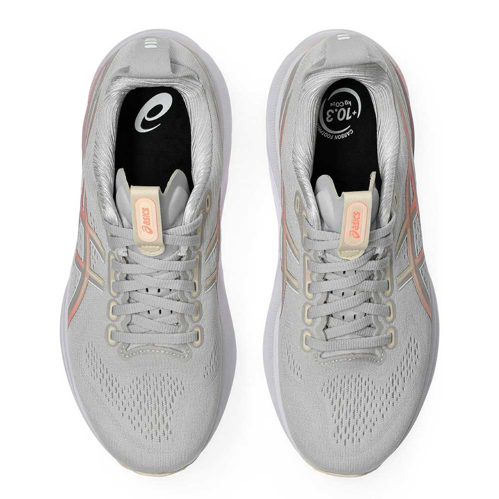 Pair of Gel-Kayano 32 gray running shoes with pink accents on a white background.