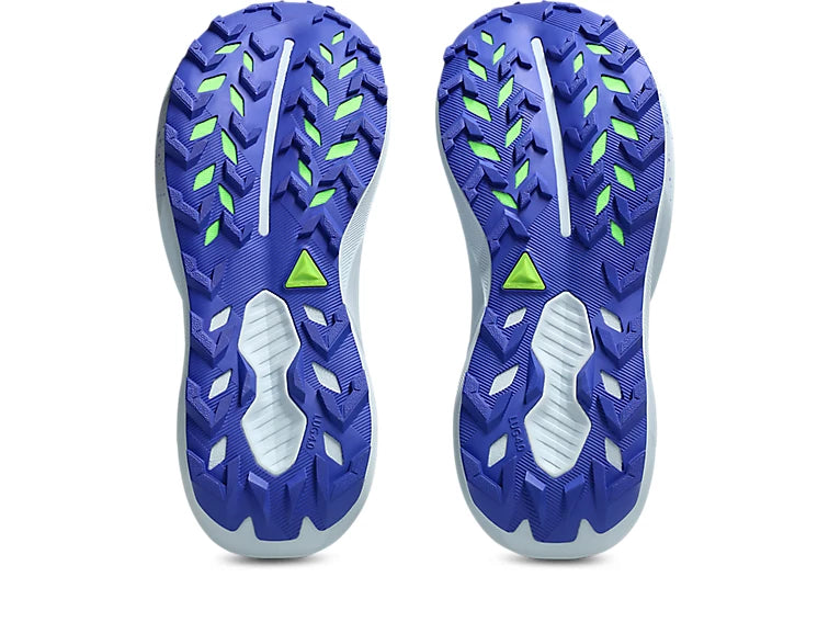 Close-up of Trabuco 14 athletic shoes with green accents on a white background