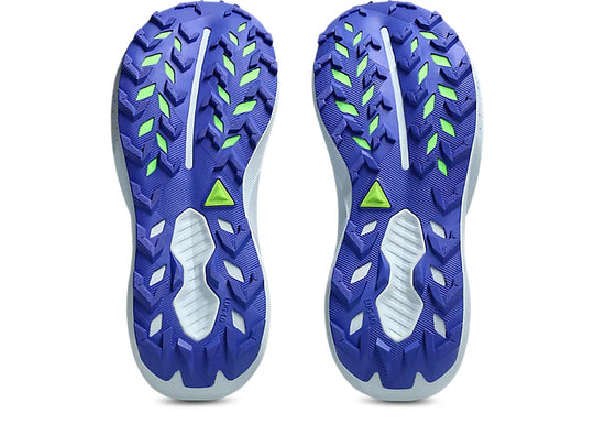 Close-up of Trabuco 14 athletic shoes with green accents on a white background