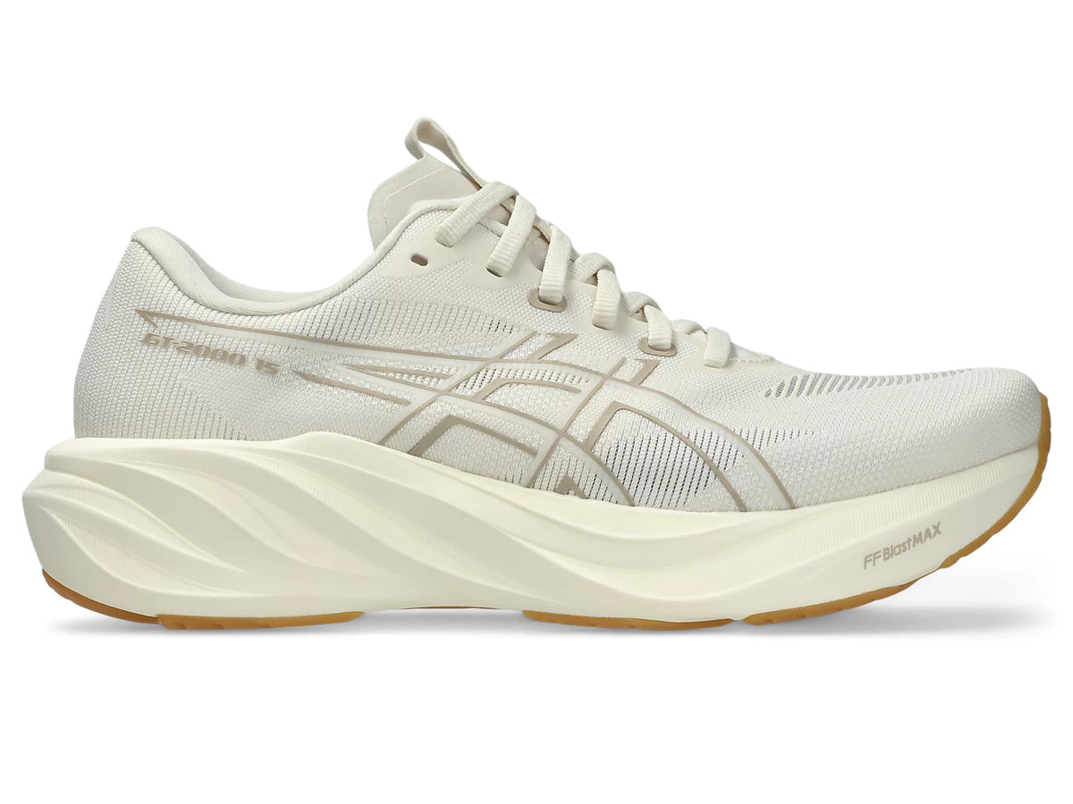 A single ASICS GT-2000 15 running shoe in off-white and beige with a thick sculpted cream midsole and a gum outsole, shown from a side profile on a white background.
