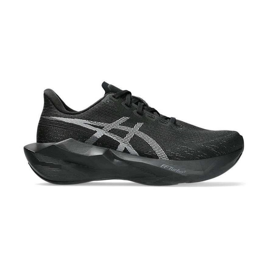 Novablast 6 a women's black running shoe with teal accents on a light gray background.