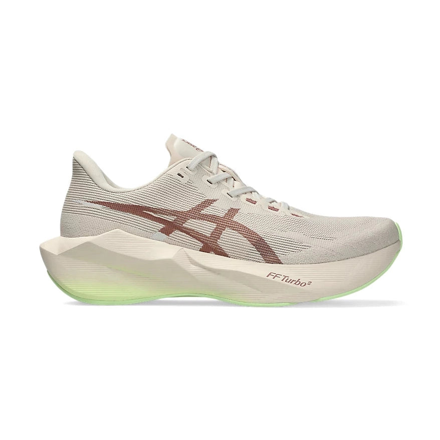 Novablast 6 a women's white running shoe with brown accents on a white background.