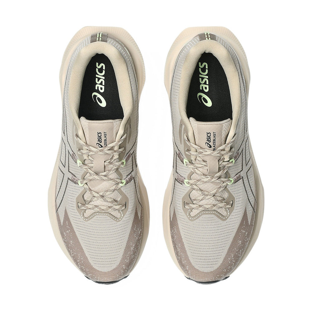 Blazeblast a women's pair of Asics running shoes in light beige and gray with black and white branding, shown from a top-down view on a white background.