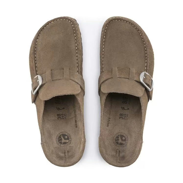 Pair of brown suede BIRKENSTOCK Buckley shoes with buckles on a white background