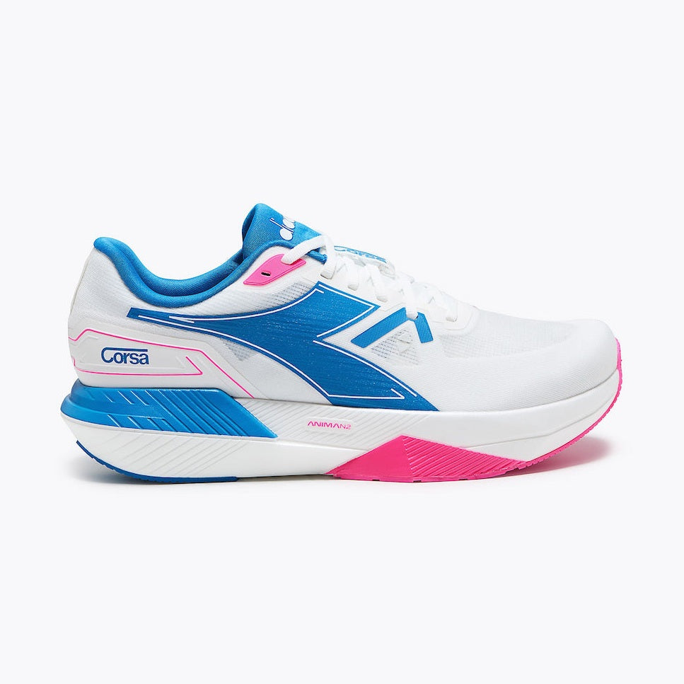 A white Diadora Corsa - Men's running shoe with blue and pink accents, featuring the Corsa logo on the heel and a blue side stripe, shown against a plain white background.