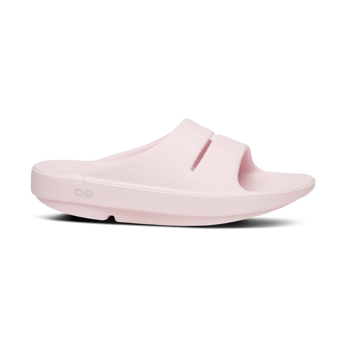 Pink OOfos OOahh slide sandal on a white background