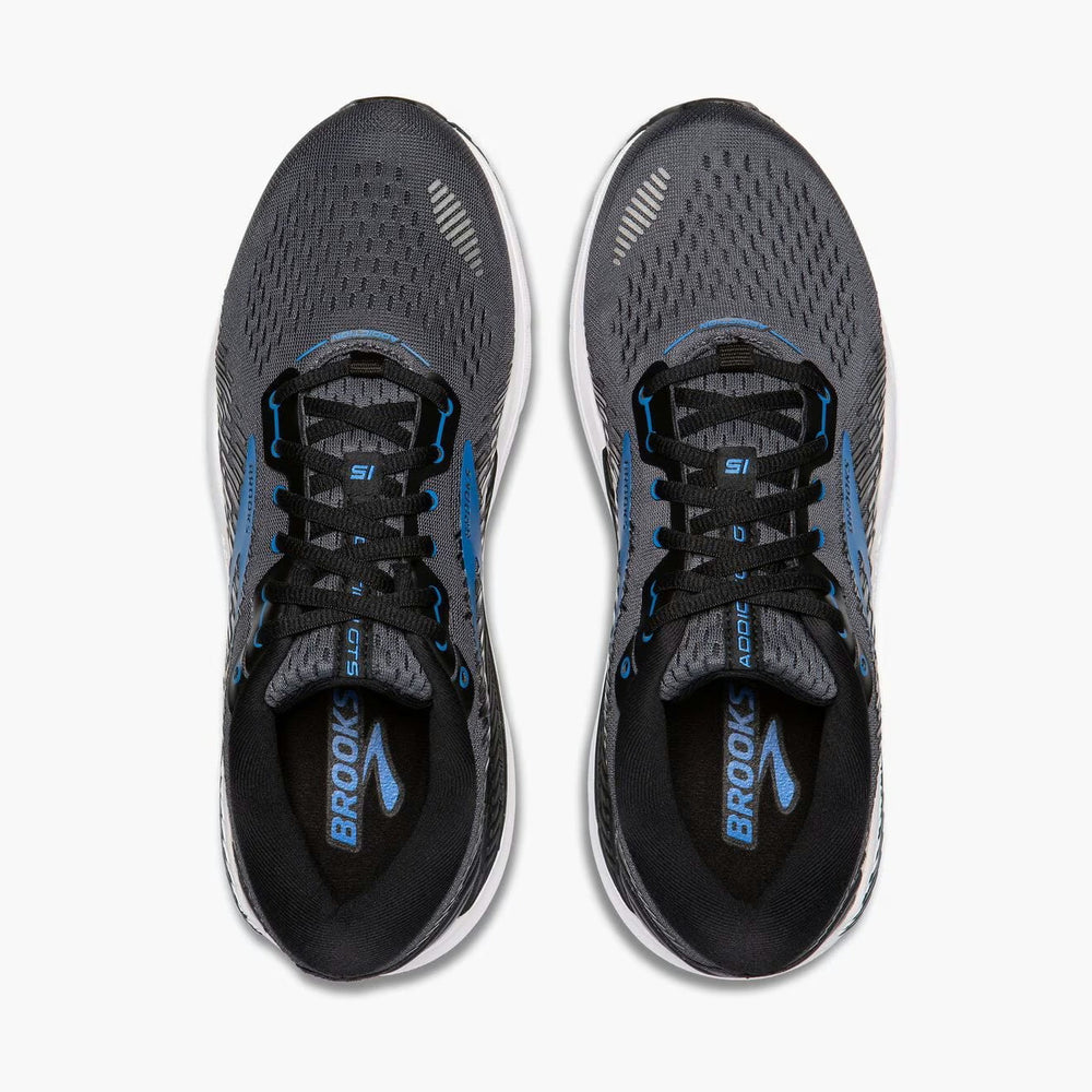 A pair of Brooks Addiction Gts 15 – Men's running shoes shown from a top-down view against a clean white background. The shoes feature a dark gray and black mesh upper with bright blue accents on the side stripes, laces, and the Brooks logo on the tongue.