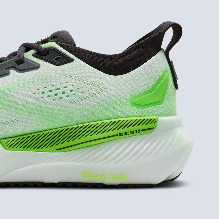 Light green Brooks Glycerin GTS 23 running shoe with black and white accents on a light gray background
