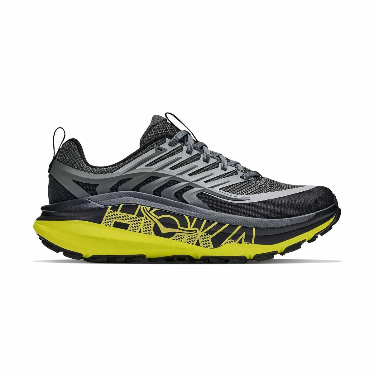 A single Stinson 8 – Men's trail running shoe shown in a side profile view against a plain white background. The shoe features a black and gray mesh upper with a prominent bright yellow midsole and matching yellow graphic accents on the side and outsole.