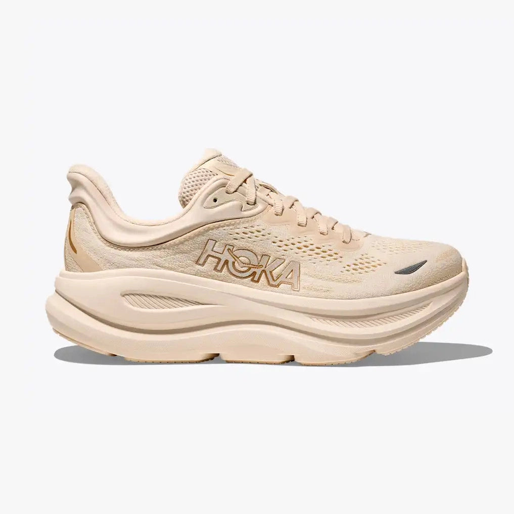 A single Hoka Bondi 9 – Women's  running shoe in a light beige and cream colorway, shown from a side profile view against a clean white background.