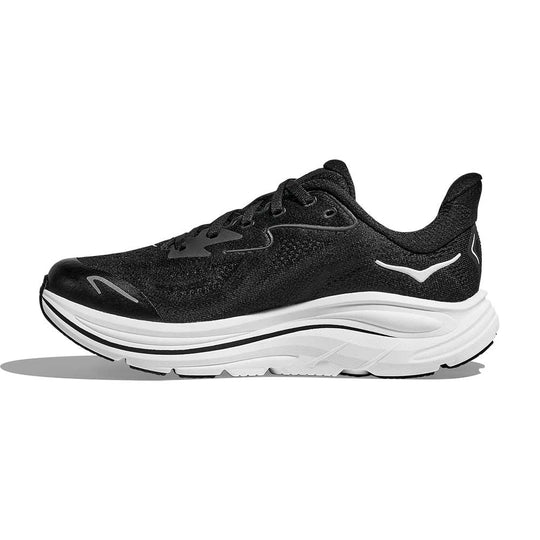 Black Clifton 10 -- Youth running shoe with white sole on a white background