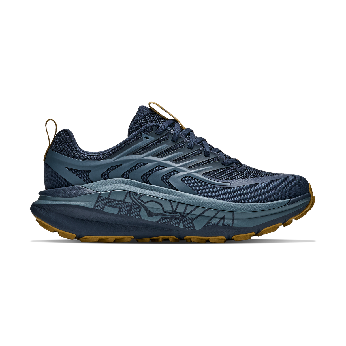 A single Stinson 8 – Men's athletic trail running shoe shown in profile against a solid white background. The shoe features a dark navy blue mesh upper with slate blue synthetic overlays, a thick patterned midsole in matching slate blue, and a rugged gum brown outsole.