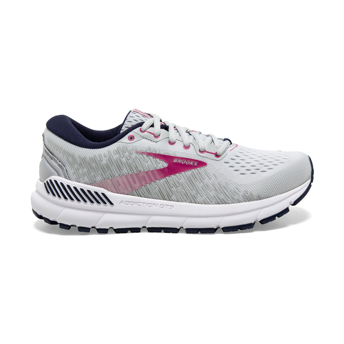 A Brooks Addiction Gts 15 – Women's running shoe in light gray and white with a prominent pink logo and navy blue accents on the collar and outsole, shown against a plain white background.