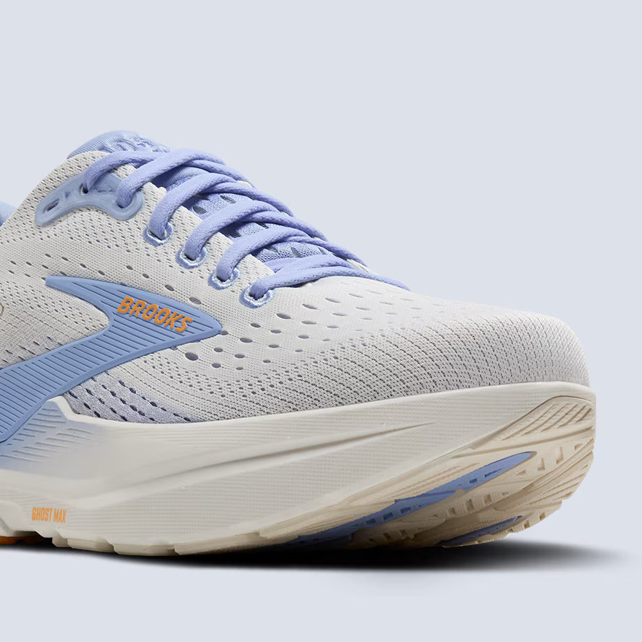 White and blue Brooks Ghost Max 3  running shoe with 'Brooks' branding on a light gray background