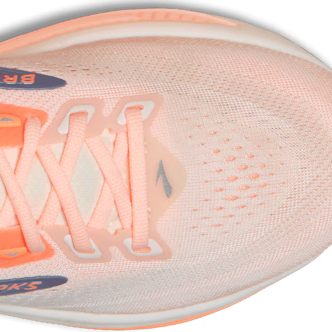 Close-up of a Brooks Ghost 18 running shoe with pink laces and 'Brooks' branding.