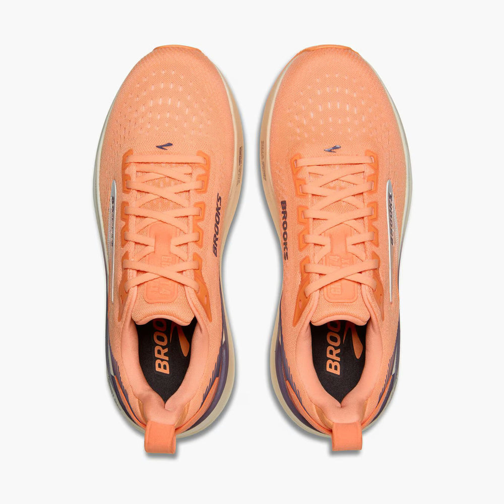 A pair of Brooks Ghost Max 4 womens running shoes in a vibrant peach-orange colorway, shown from a top-down view on a clean white background.