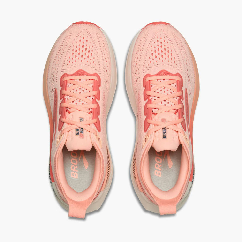 A pair of Brooks Glycerin Gts 23 – Women's running shoes in a coral pink and peach colorway, shown from a top-down view on a clean white background.