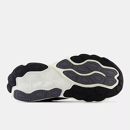Close-up of a shoe sole with black and white pattern on a white background