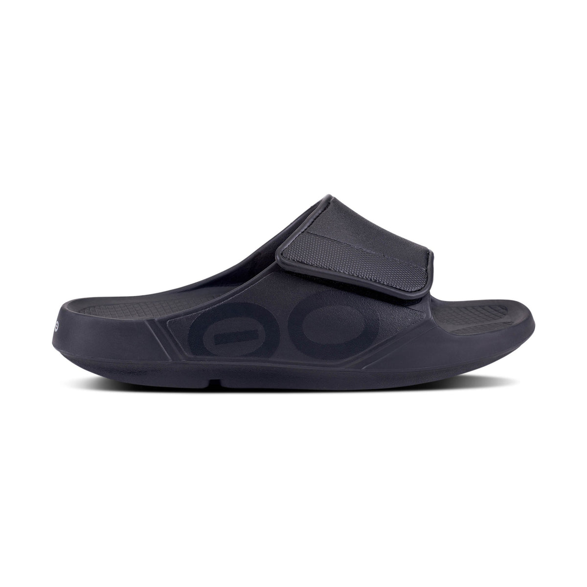 Black OOfos OOahh Sport Flex sandal with a strap on a white background