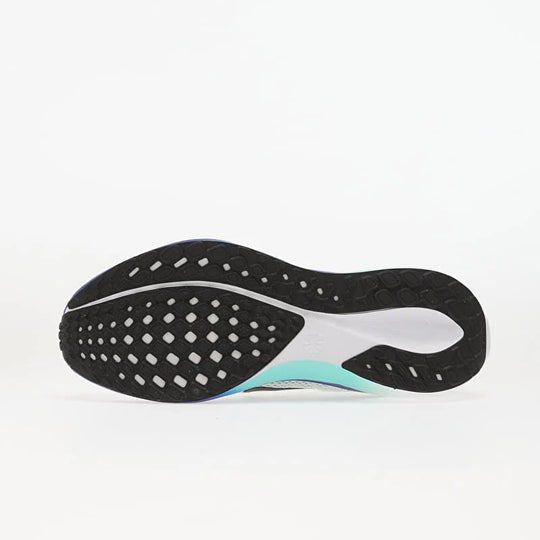 The outsole of a running shoe shown from a side profile view, featuring a black textured tread with a grid pattern, a white midsole insert, and a light blue accent near the heel on a white background.