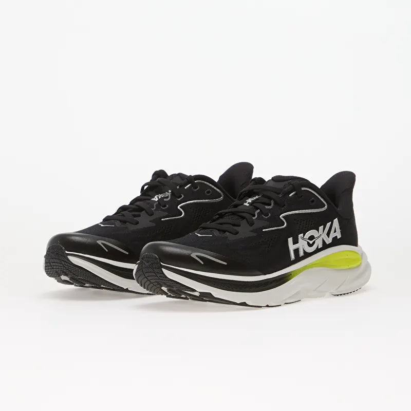 A pair of black Clifton 10 -- Youth running shoes with white and neon yellow accents, displayed on a clean white background.