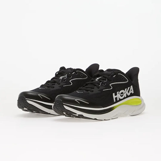 A pair of black Clifton 10 -- Youth running shoes with white and neon yellow accents, displayed on a clean white background.