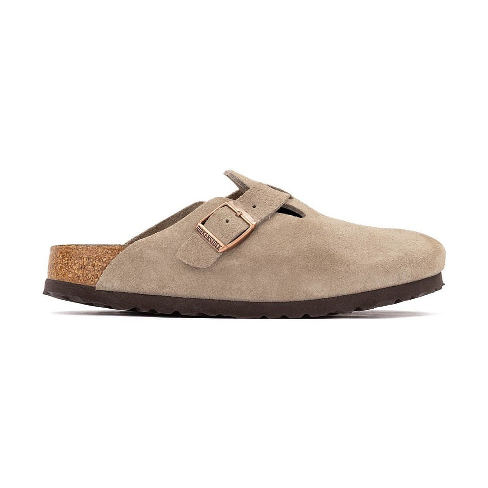 A single taupe suede Birkenstock Boston Soft Footbed log-style mule shoe with a double strap buckle closure and a cork footbed, shown in profile against a plain white background.