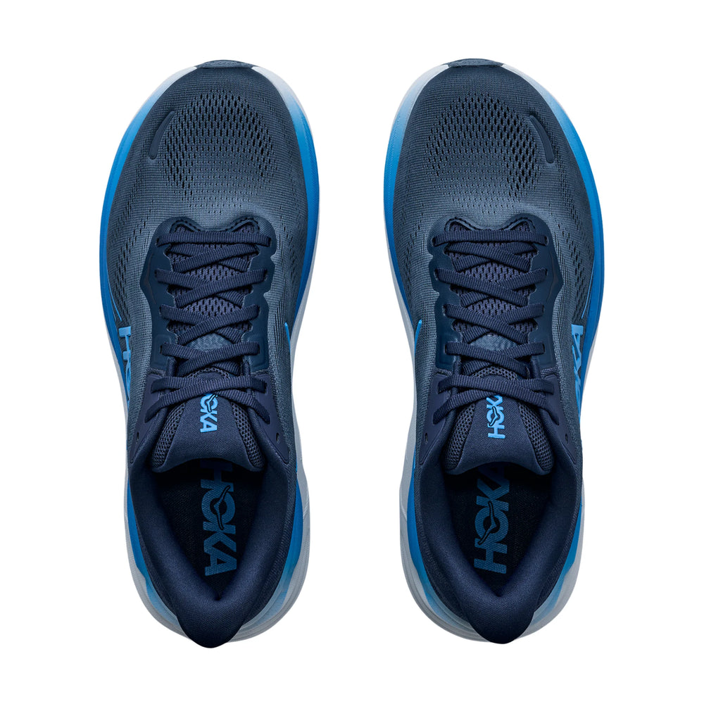 Pair of blue Hoka Clifton 11 – Men's running shoes with 'Hoka' branding on a white background