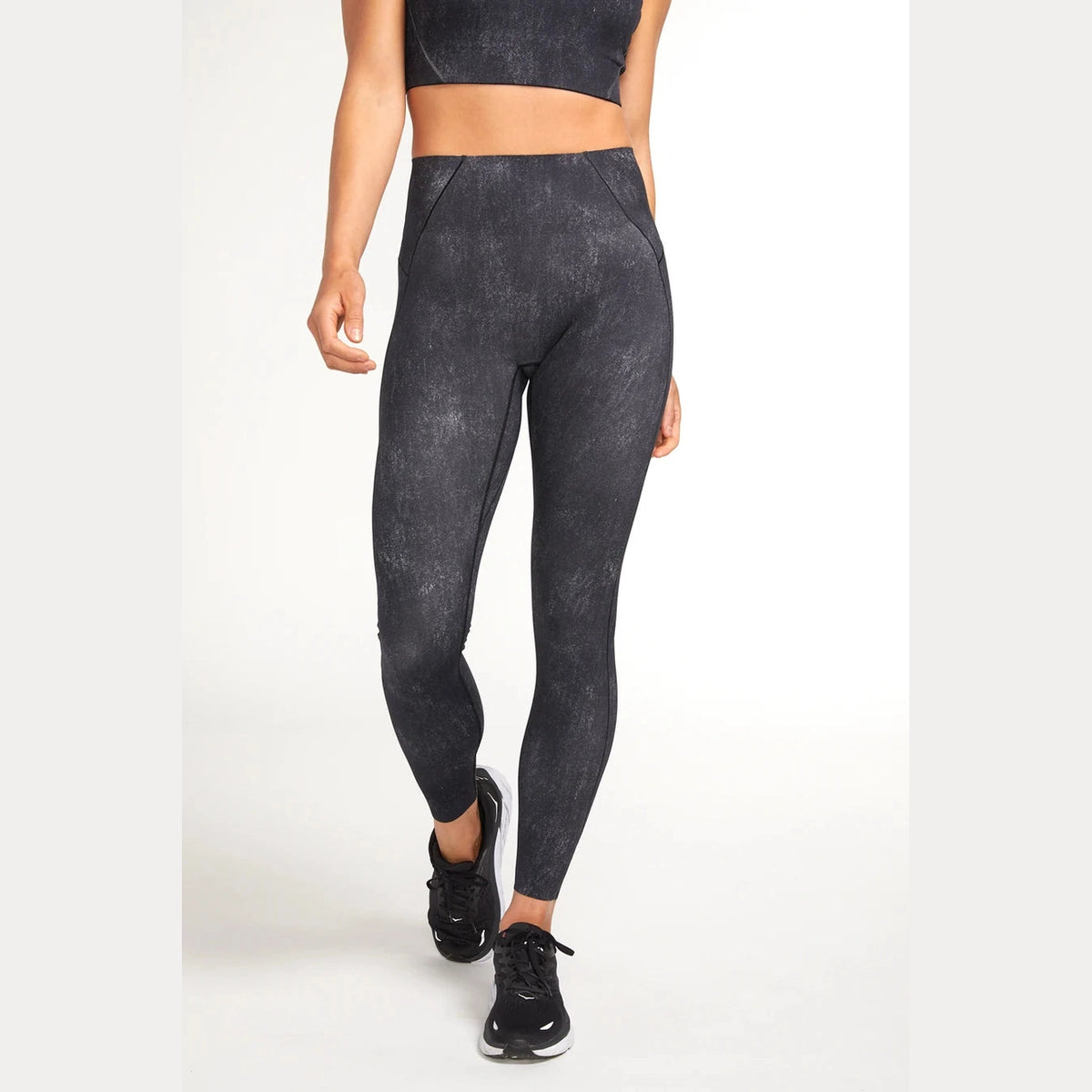 Person wearing dark gray Alwrld Alrn Hi Waist 7/8 Tight – Women's on a white background
