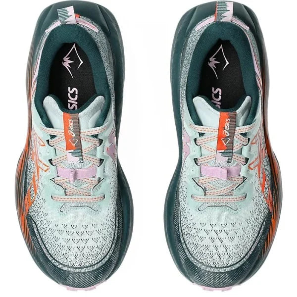 A pair of ASICS Trabuco Max 4 running shoes shown from a top-down view, featuring a light mint green and white mesh upper with orange and pink accents, dark teal midsoles, and black ASICS logos on the insoles.
