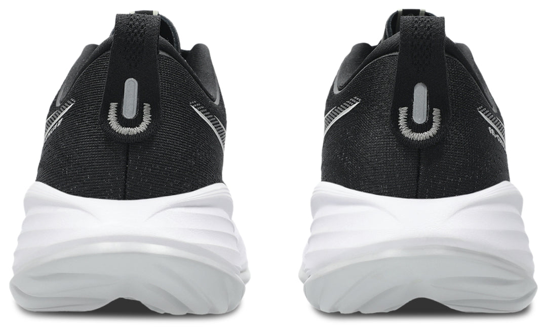 Black and white Gel Cumulus 27 athletic sneakers shown from the rear, featuring a textured black upper, a white chunky sole, and a pull tab with a silver U-shaped logo.