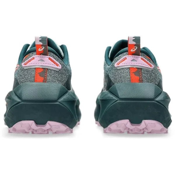 A pair of Trabuco Max 4 trail running shoes shown from the rear, featuring a dark teal and gray mesh upper with bright orange accents and a chunky dark teal midsole and light pink outsole.