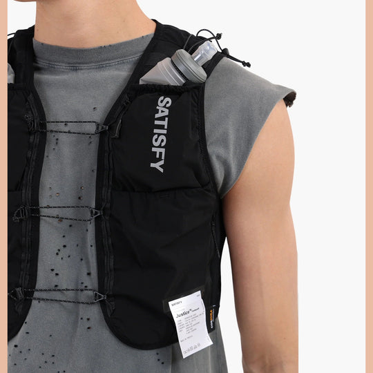 Person wearing a black Justice Cordura 5L Hydration Vest with &