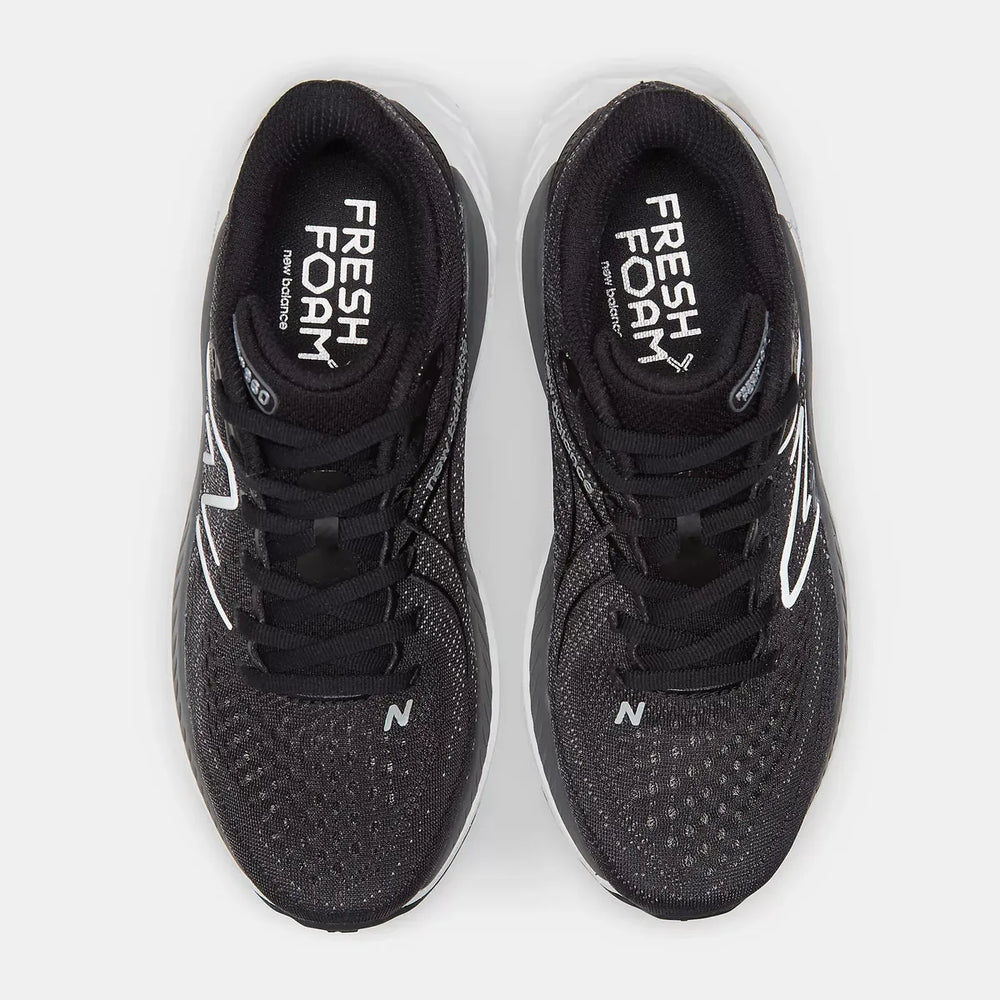 Black New Balance 860 V13 – Women's running shoes with 'Fresh Foam' and 'New Balance' branding on a white background