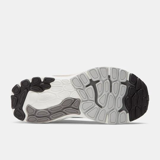 The outsole of a running shoe shown from a top-down view, featuring a white, gray, and black tread pattern on a light gray background.