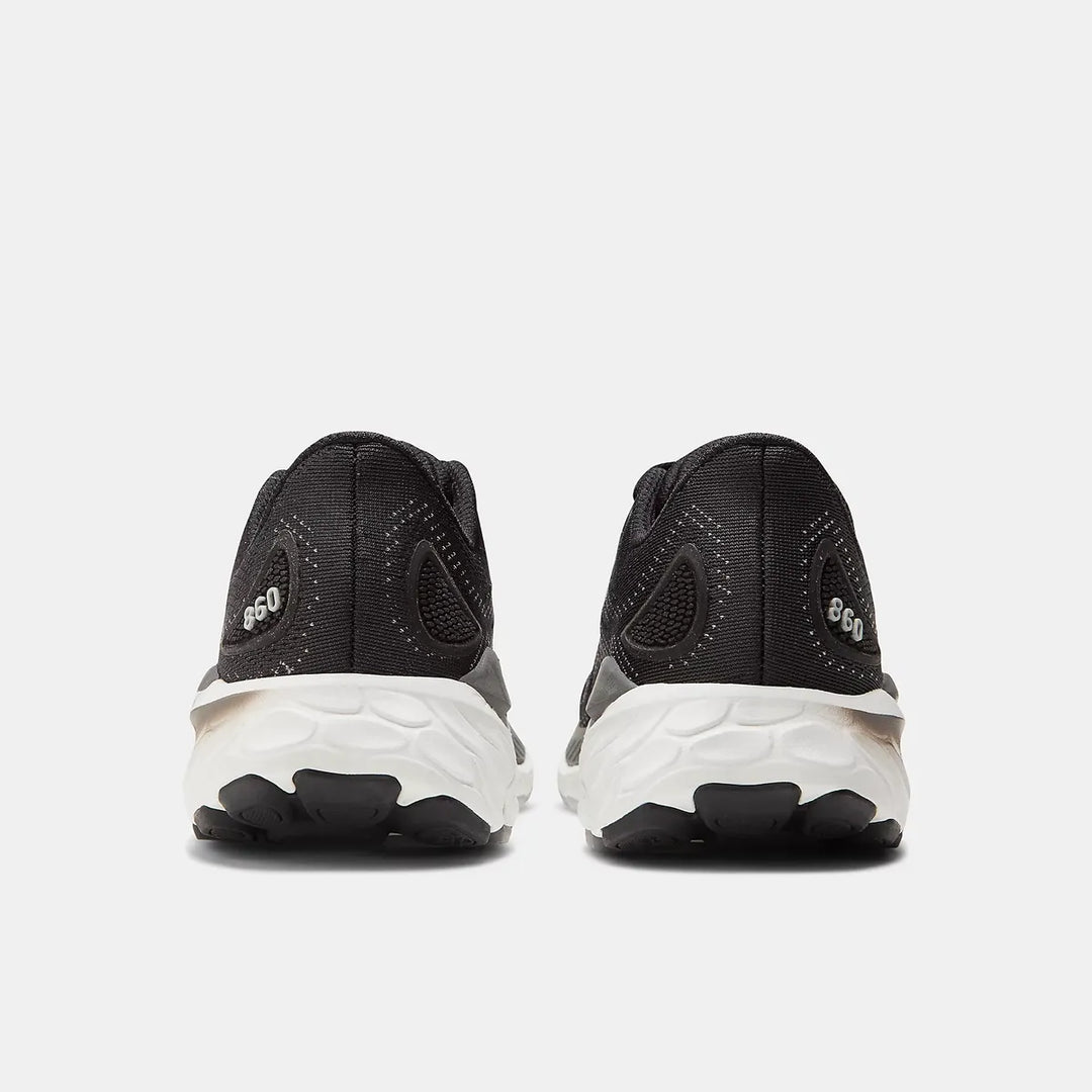 Black and white New Balance 860 V13 – Women&