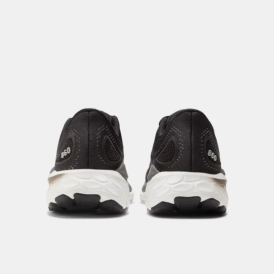 Black and white New Balance 860 V13 – Women&