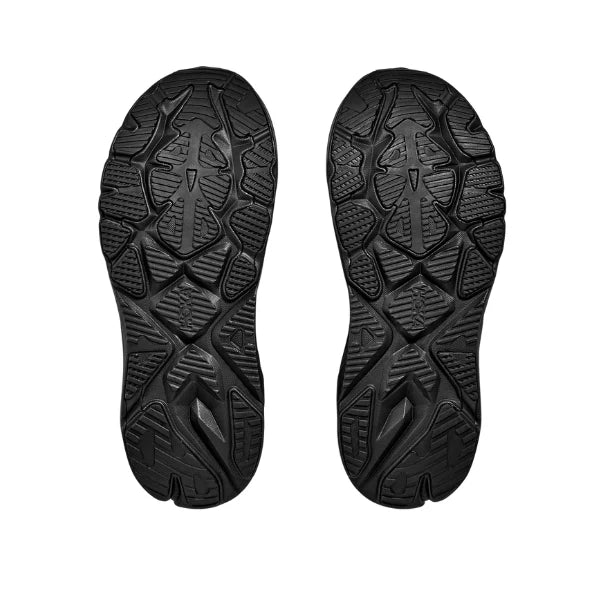 A pair of black athletic shoes shown from the sole view, displaying their textured, treaded rubber outsoles against a solid white background.