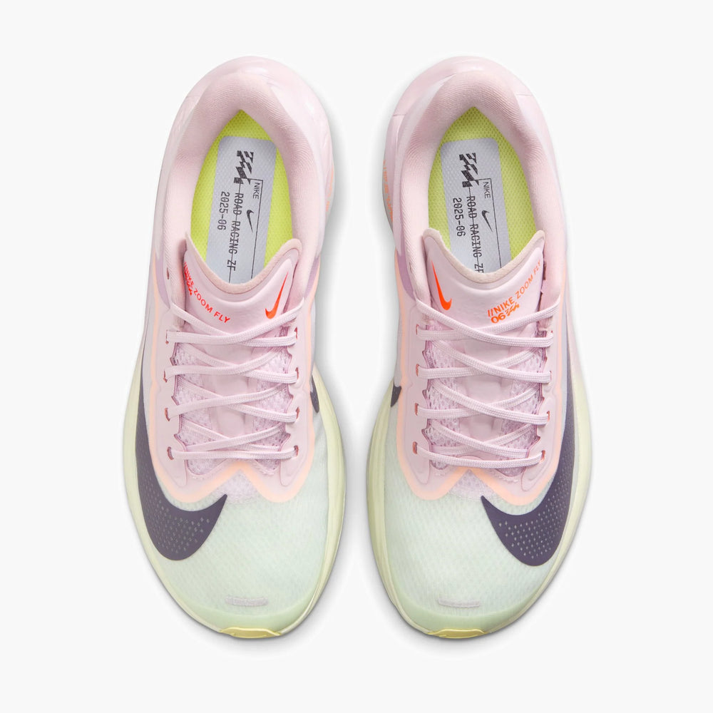 Pair of pastel pink and green Nike Zoom Fly 6 - Women's running shoes on a white background