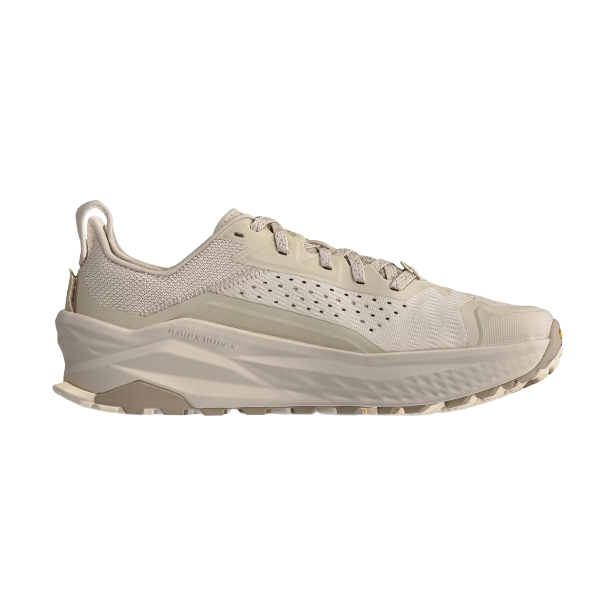 Olympus 6 a women's beige running shoe on a white background.