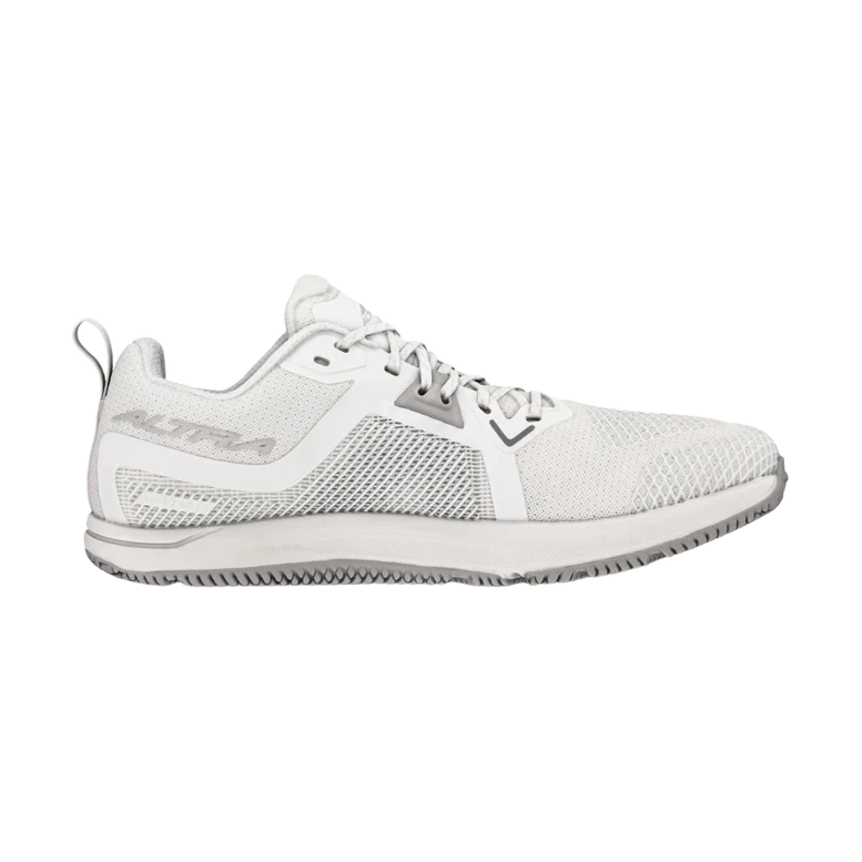 Solstice XT 3 a women's white and light gray athletic shoe shown from the side against a plain white background.